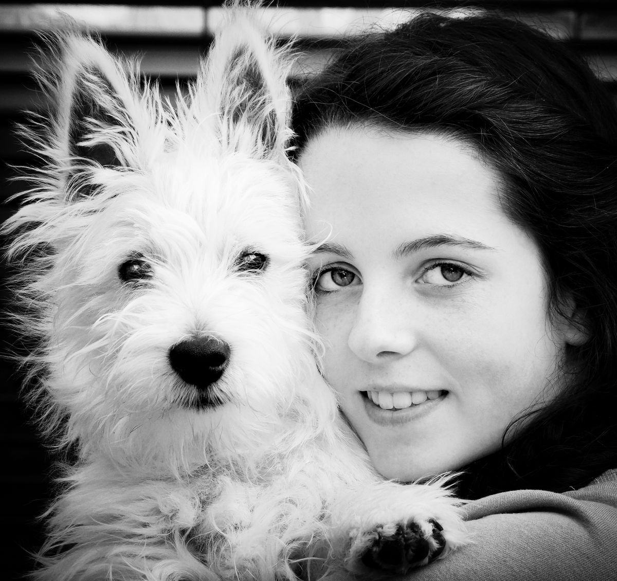 My daughter with her beloved friend Max, a West Highland Terrier.