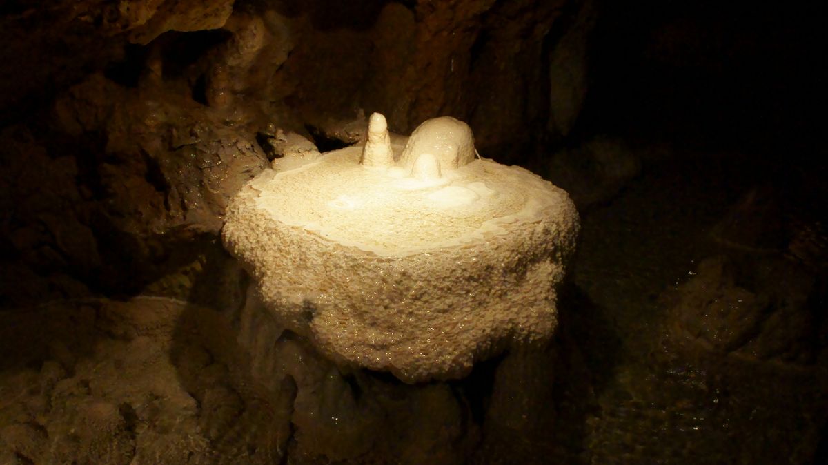 Underground Stalagmite and underground river